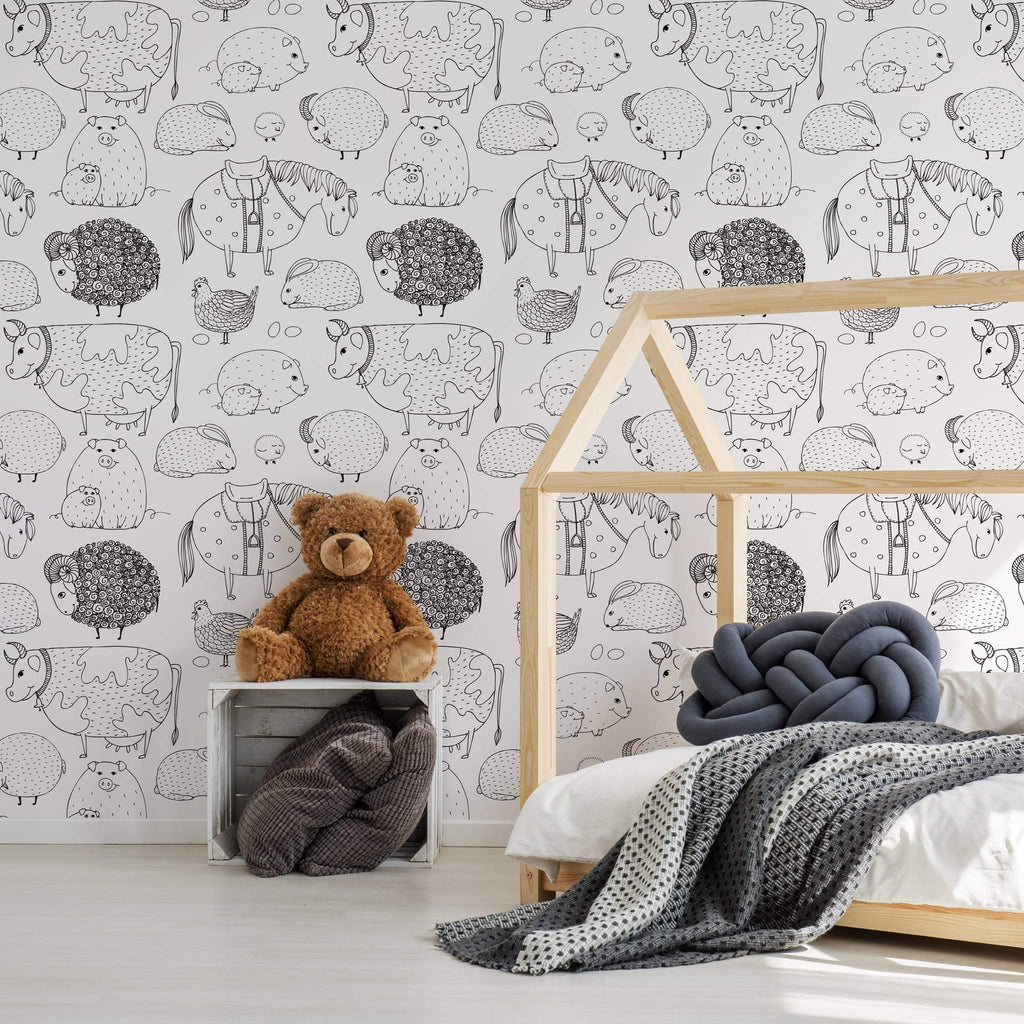 dětský pokoj s černobílou tapetou, medvídkem a posteli